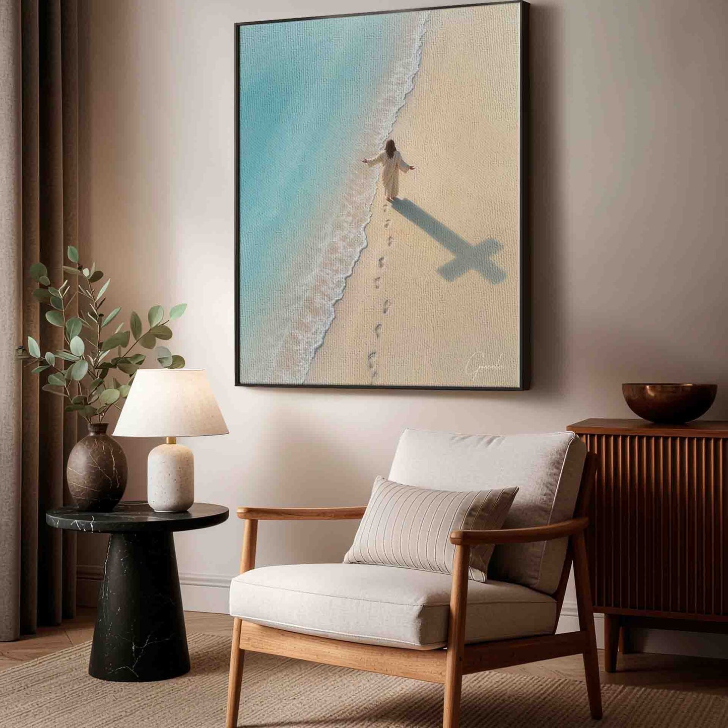 Elongated cross shadow formed by Christ's footprints across the beach.