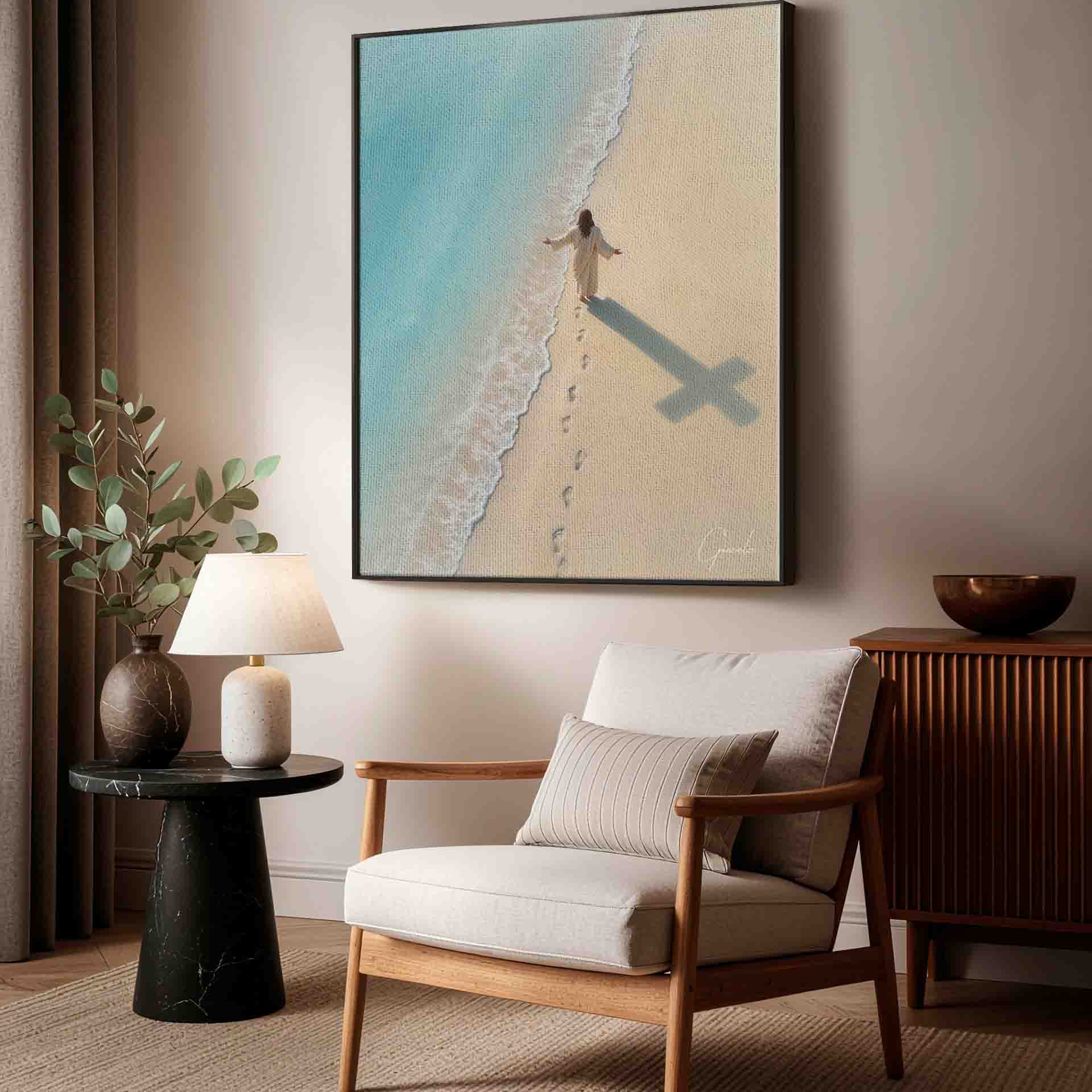 Elongated cross shadow formed by Christ's footprints across the beach.