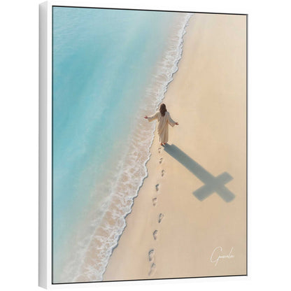 Robed Christ walking on a sandy beach leaving footprints with a cross-shaped shadow in the sand.