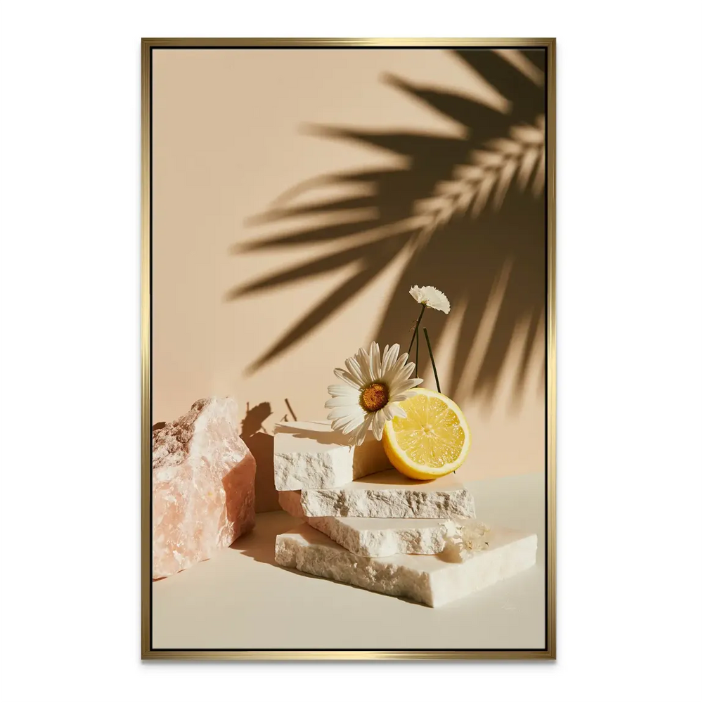 Arrangement of stones, daisies, lemon, and rose quartz on the warm peach-beige backdrop