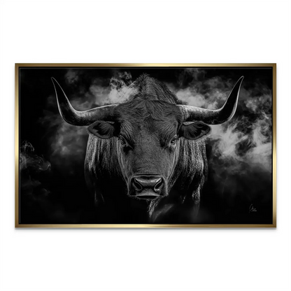 Dramatic bull in black and white with wisps of mist for depth