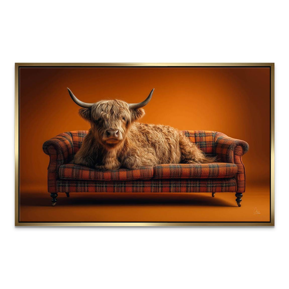 Side view of Highland cow on plaid sofa, central canvas print.