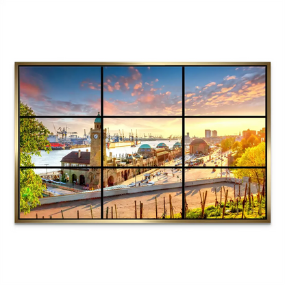 Close view of golden sunset tones reflecting on the Elbe River beside Hamburg's skyline.