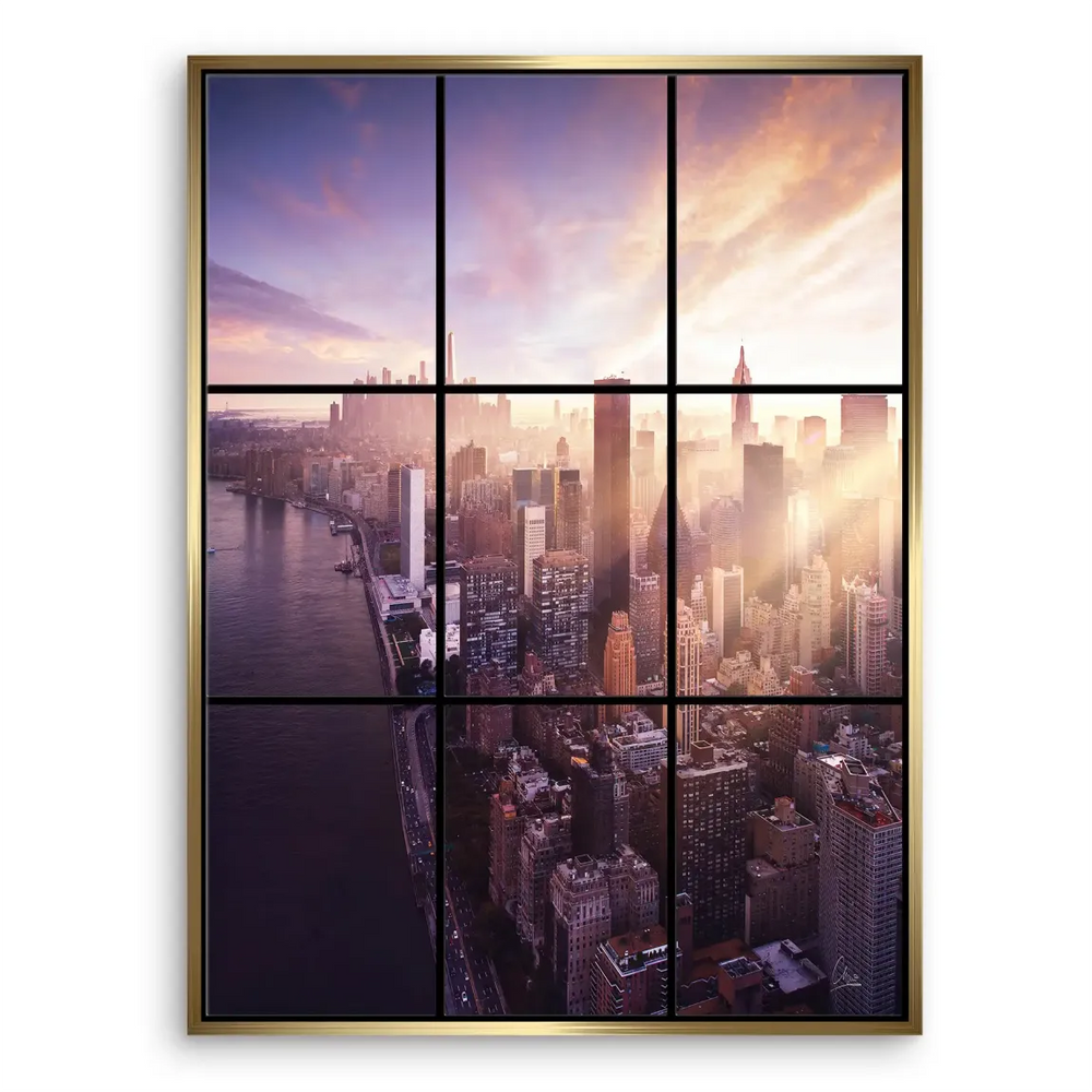 Warm yellow and orange sky reflecting on glass buildings