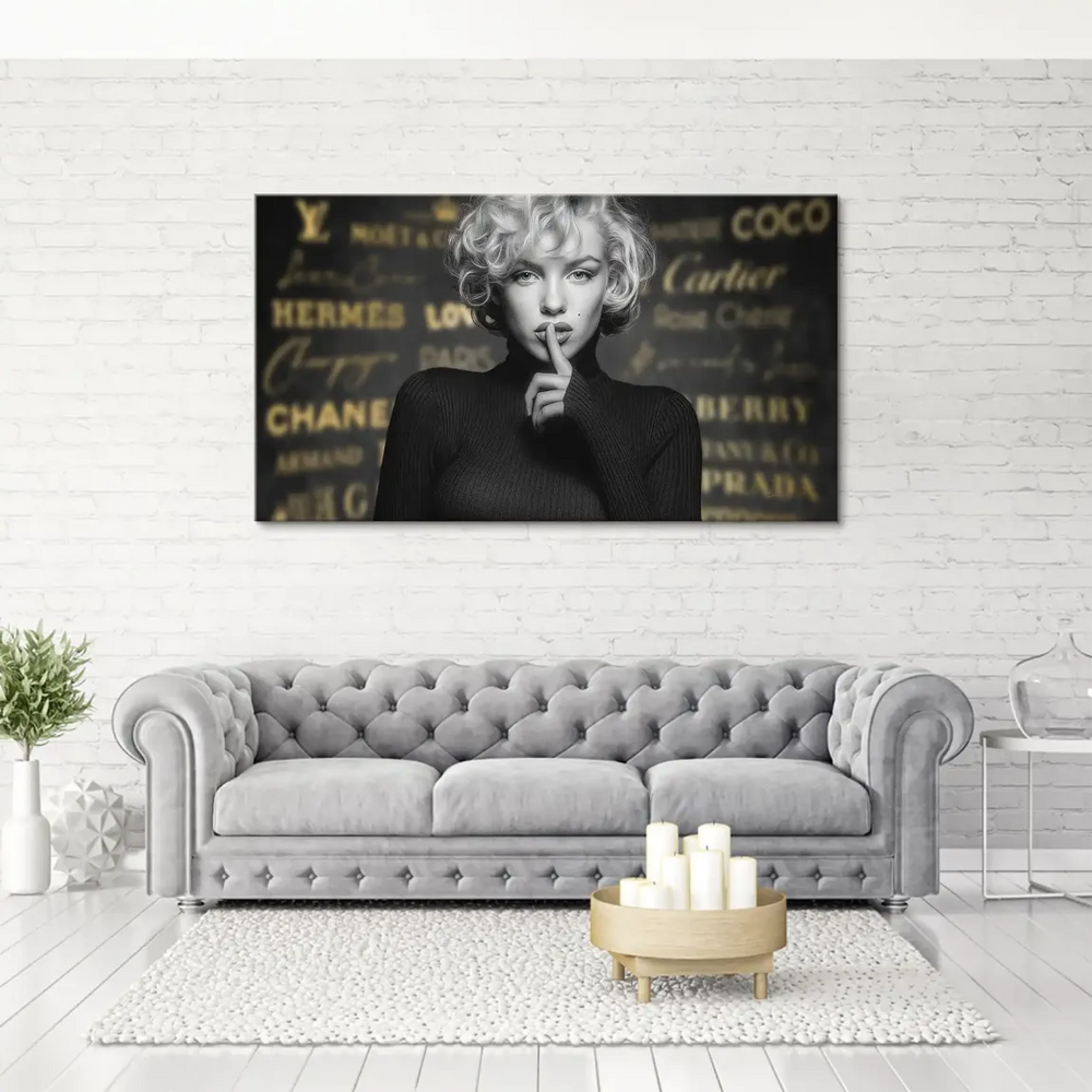 Gold luxury brand names like Chanel, Hermes, Cartier, and Prada visible behind the portrait.