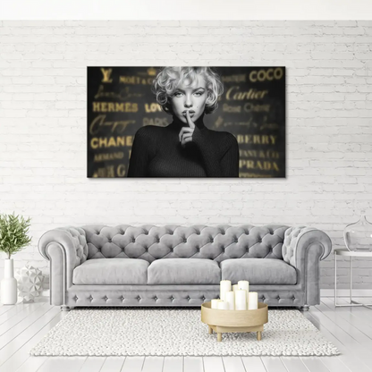 Gold luxury brand names like Chanel, Hermes, Cartier, and Prada visible behind the portrait.