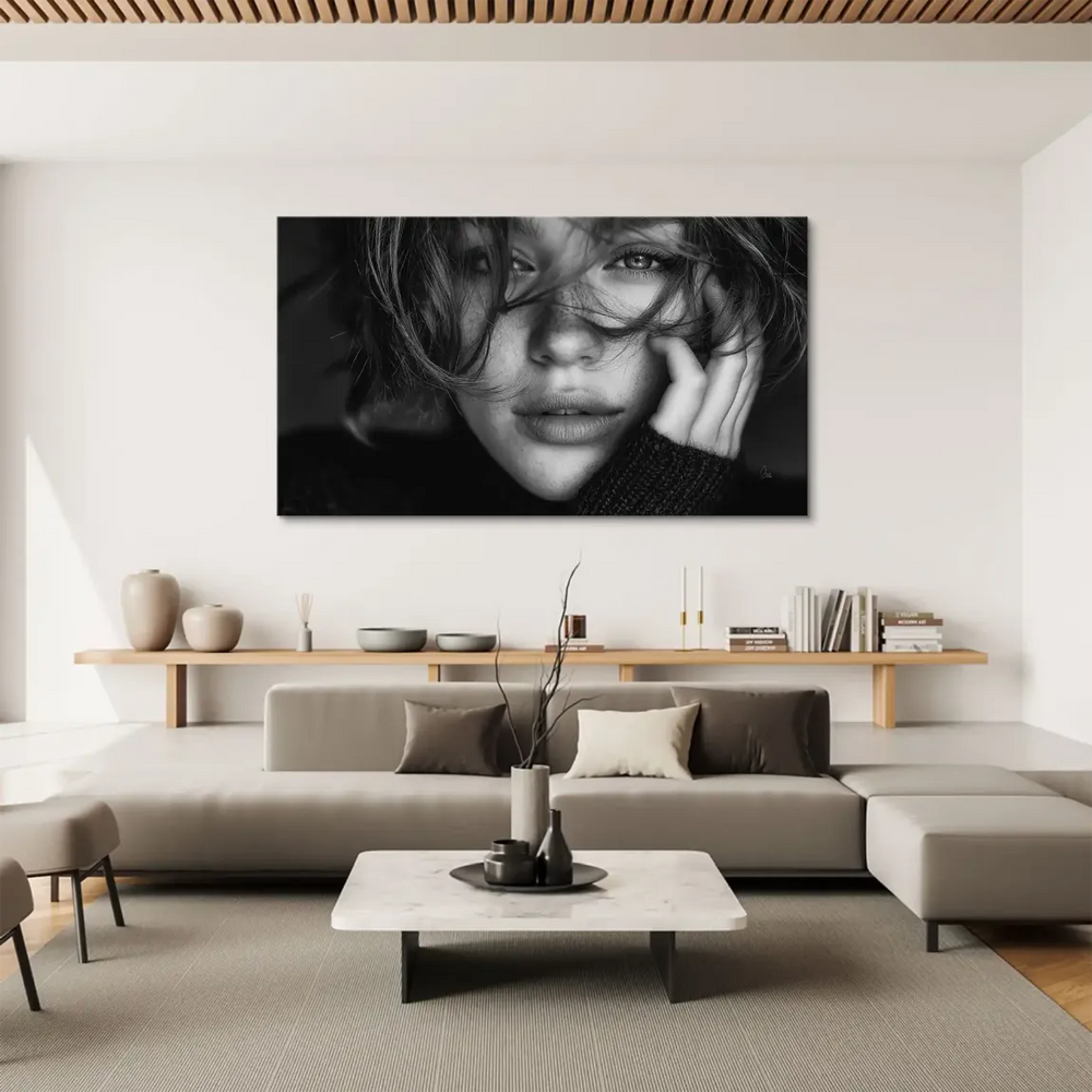 Monochrome canvas print featuring a thoughtful female face with dramatic shadows