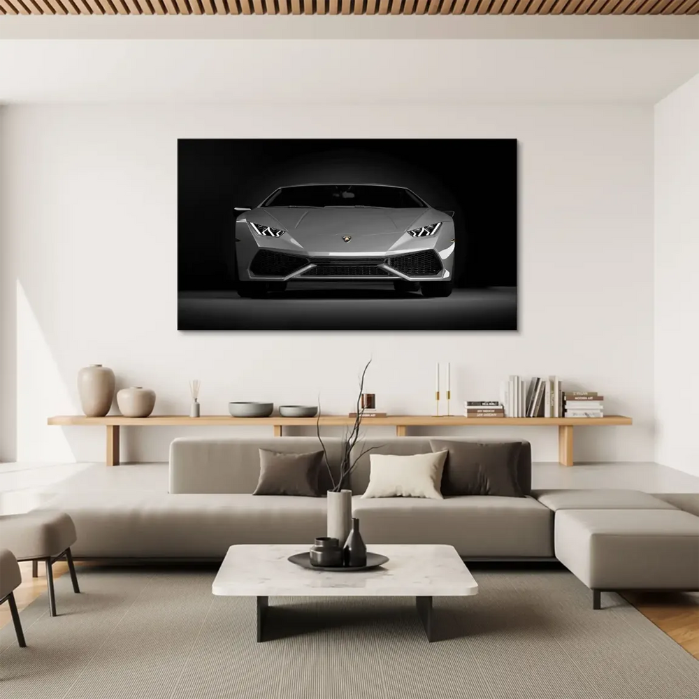 Close-up detail of the car's grille and metallic silver-grey body in grayscale wall art.