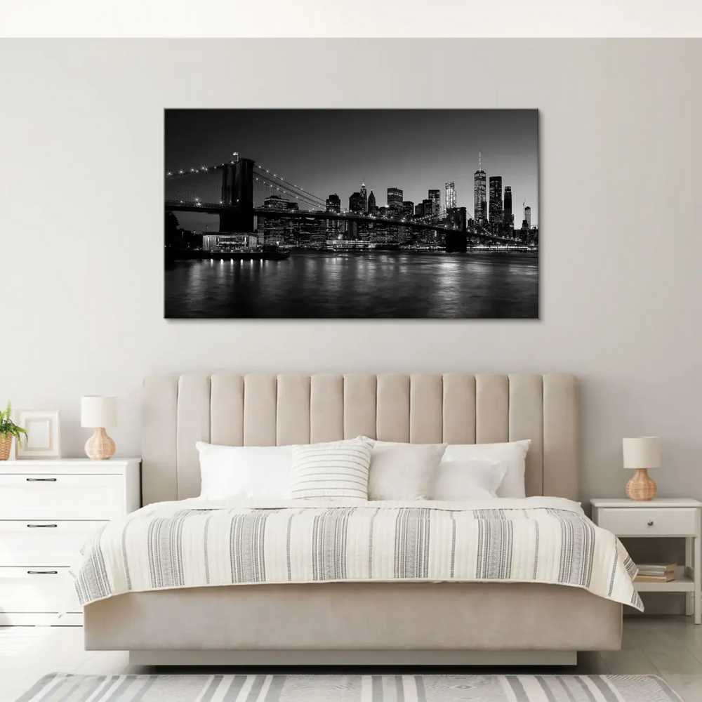 One World Trade Center rising above a dark NYC skyline on a canvas print.