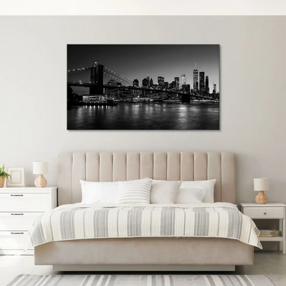 One World Trade Center rising above a dark NYC skyline on a canvas print.