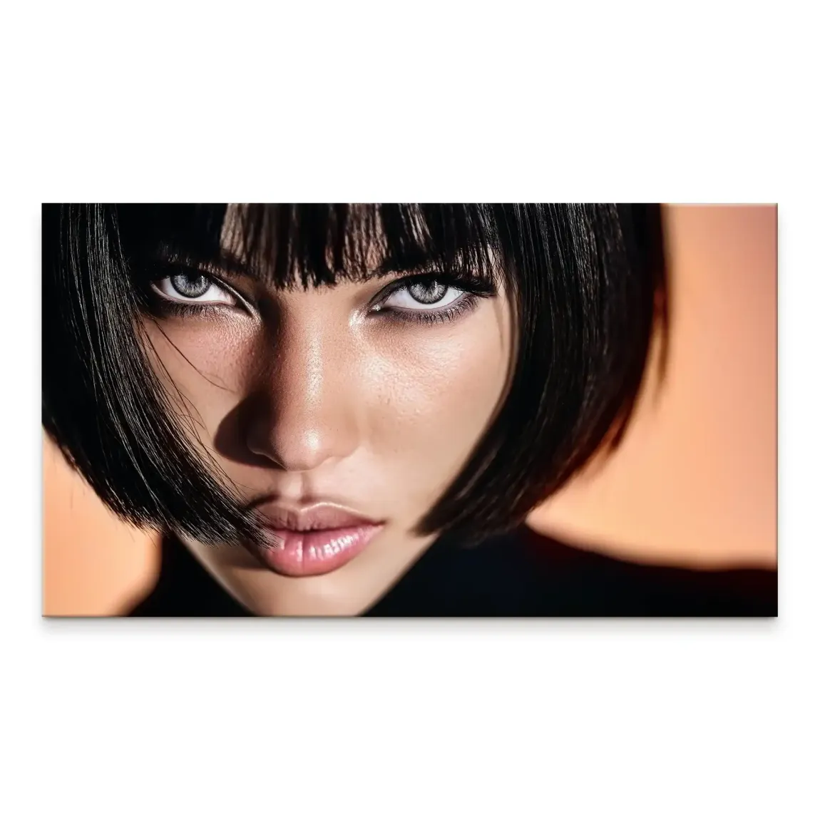 Close-up portrait of a woman with a dark bob hairstyle against an orange-peach background