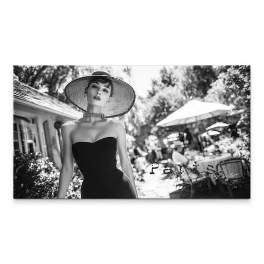 Glamorous Audrey Hepburn-inspired woman in a strapless black dress with a wide-brim hat on a black-and-white canvas with Parisian cafe backdrop