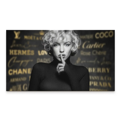 Black-and-white Marilyn Monroe portrait on canvas with a shushing gesture and a blurred gold-brand background.