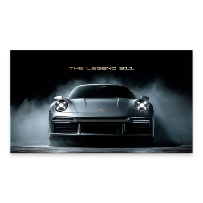 Front-on view of a silver Porsche 911 with smoky dark background and gold THE LEGEND 911 text.