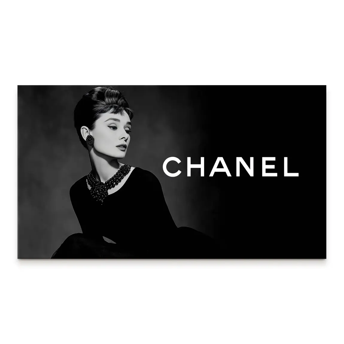Audrey Hepburn in black-and-white portrait on canvas with elegant gown