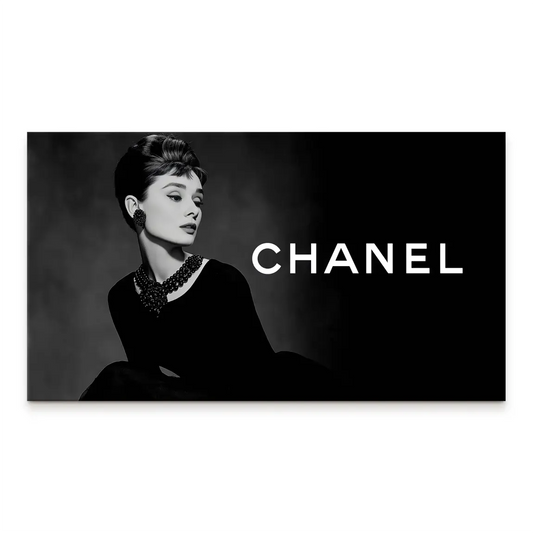 Audrey Hepburn in black-and-white portrait on canvas with elegant gown