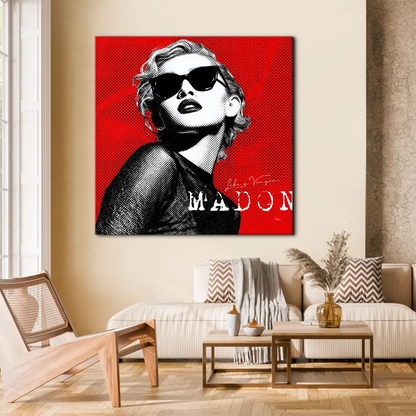 Close-up portrait of Madonna-inspired figure wearing dark sunglasses on red canvas