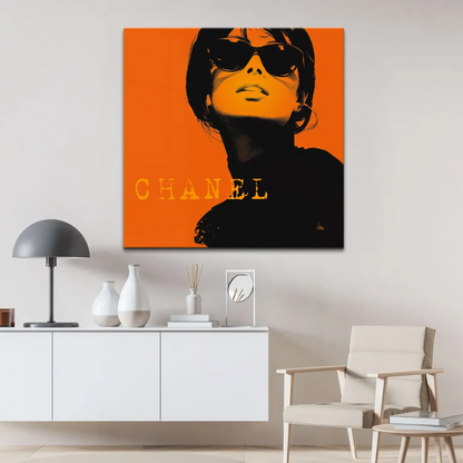 Chanel branding on an orange-toned retro art canvas with halftone texture.