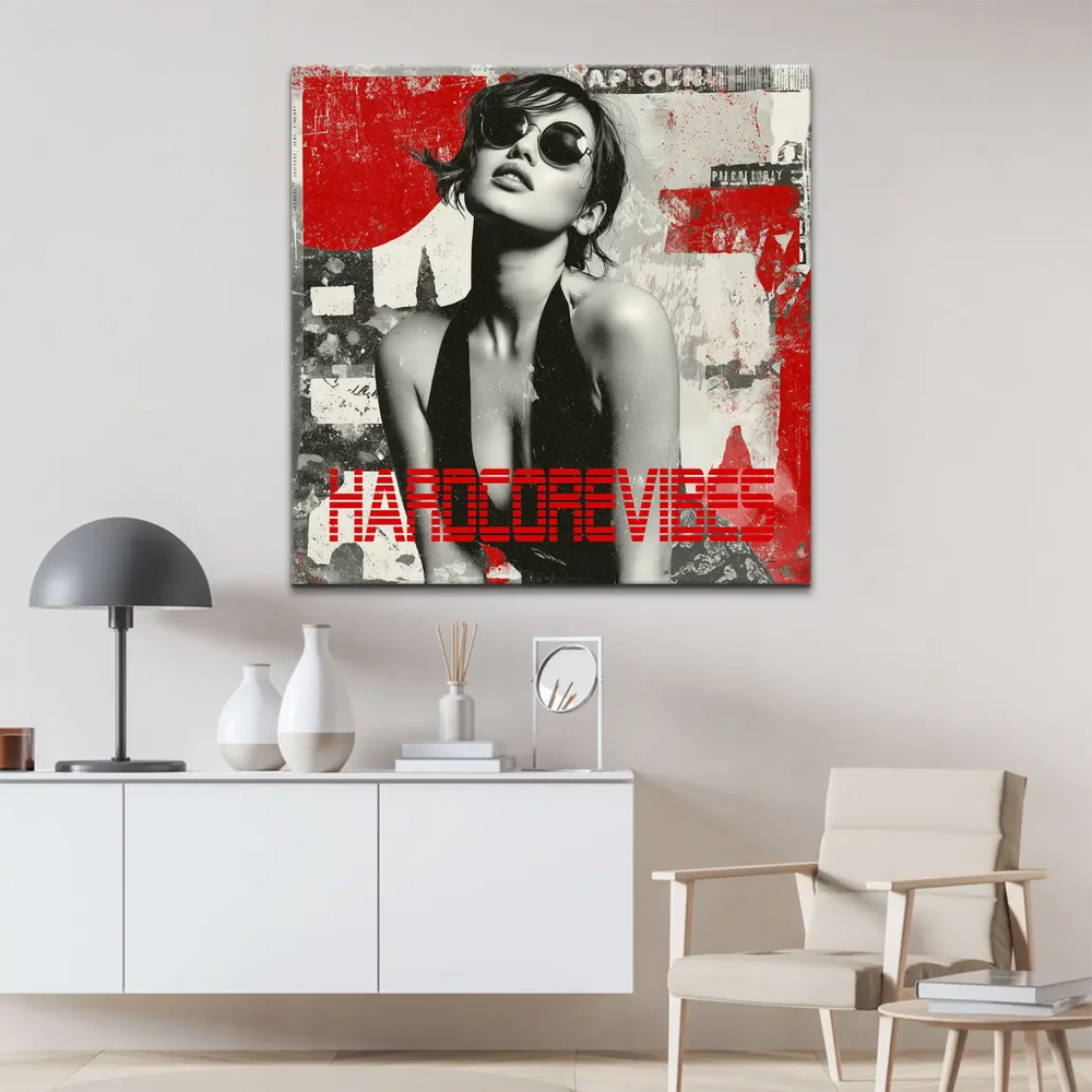 Edgy canvas art featuring a centered female portrait with a rebellious gaze and torn poster textures in grayscale.