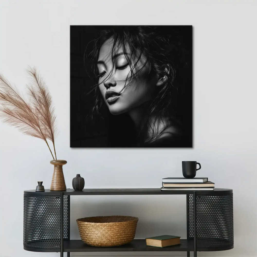 High-contrast grayscale canvas featuring soft hair framing the face.