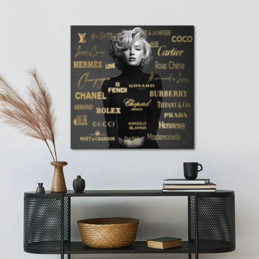 Elegant Marilyn Monroe portrait on canvas featuring gold brand names in the background.
