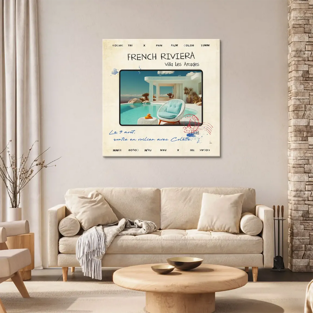 White rattan chair with a light blue cushion beside a seaside villa scene.