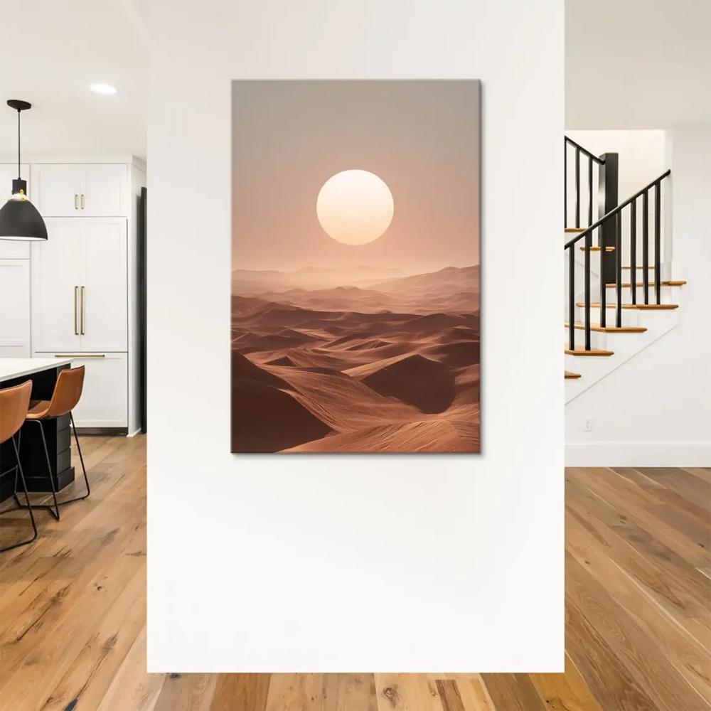 Soft peach sky and muted gray horizon above expansive desert dunes.