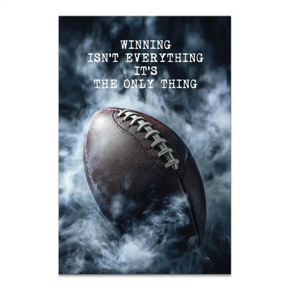Dramatic brown American football with white laces emerging from smoky white and gray background
