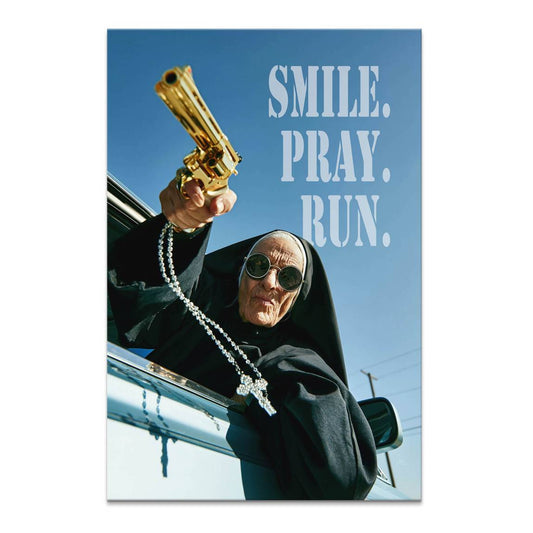 Elderly nun wearing sunglasses leans from a car window holding a gold pistol and rosary against a bright blue sky.