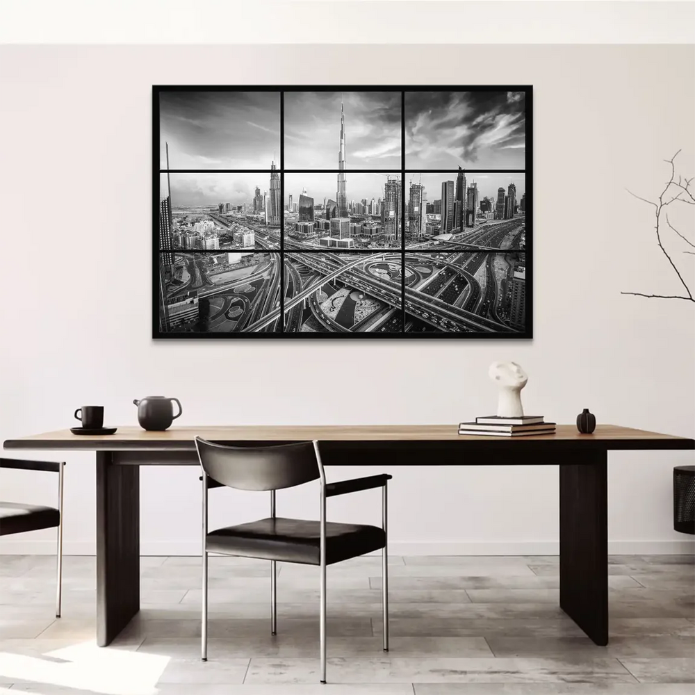 Monochrome view emphasizing Dubai's architectural lines and glass towers against a grayscale sky