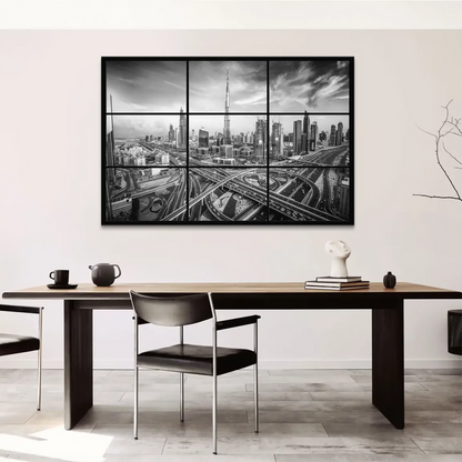 Monochrome view emphasizing Dubai's architectural lines and glass towers against a grayscale sky