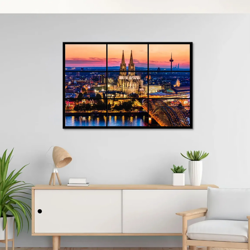 Rhine River reflecting city lights beside the Hohenzollern Bridge
