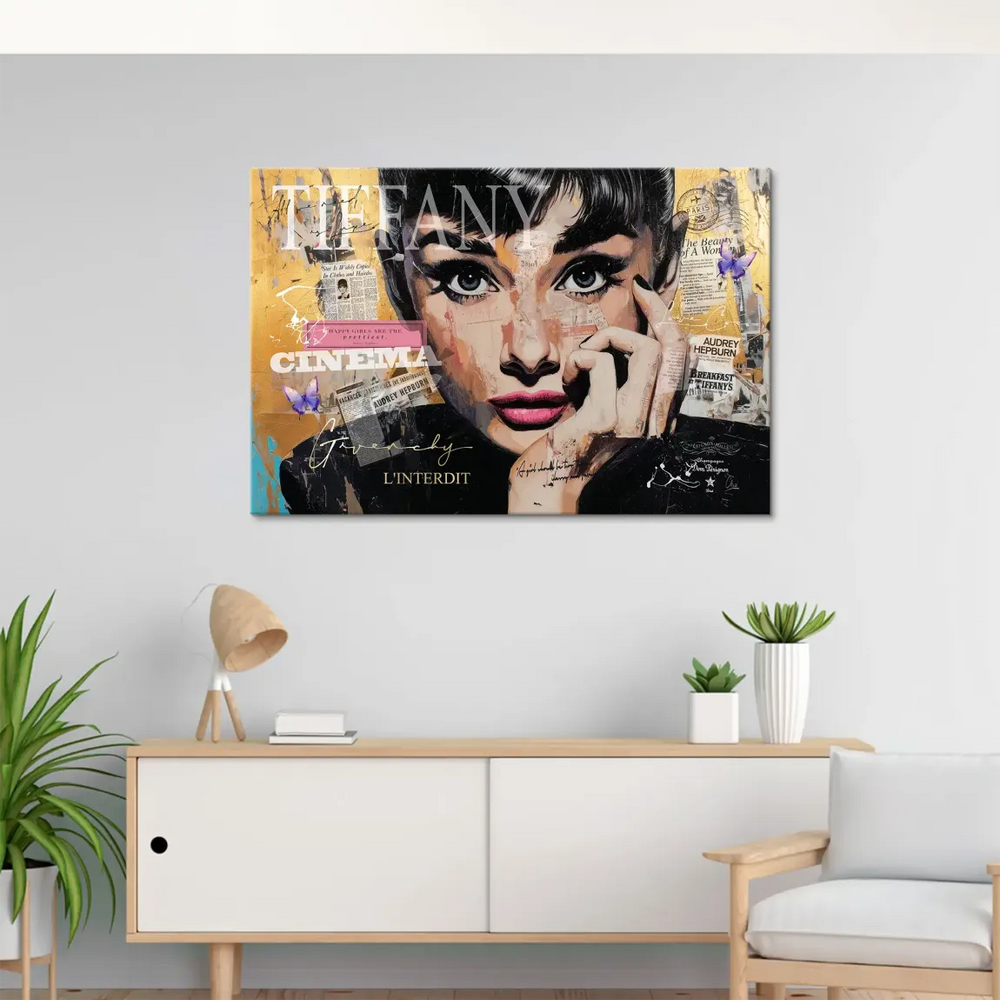 Glimmering gold specks and paint splatters add glamour to the pop art canvas.