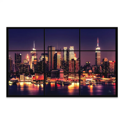Nighttime New York City skyline across a calm river, shown as a multi-panel canvas print
