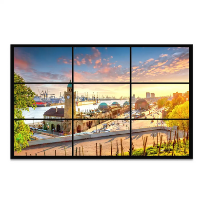 Vibrant Hamburg sunset cityscape across a multi-panel canvas print featuring the harbor skyline and clock tower.