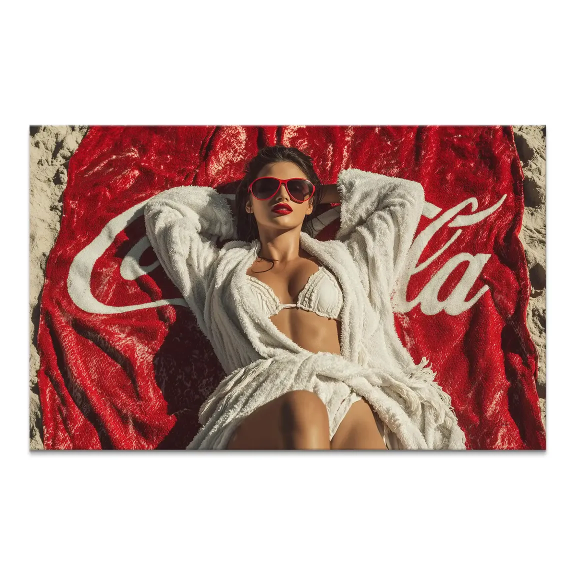 Glamorous woman lounging on a vibrant red Coca-Cola branded beach towel