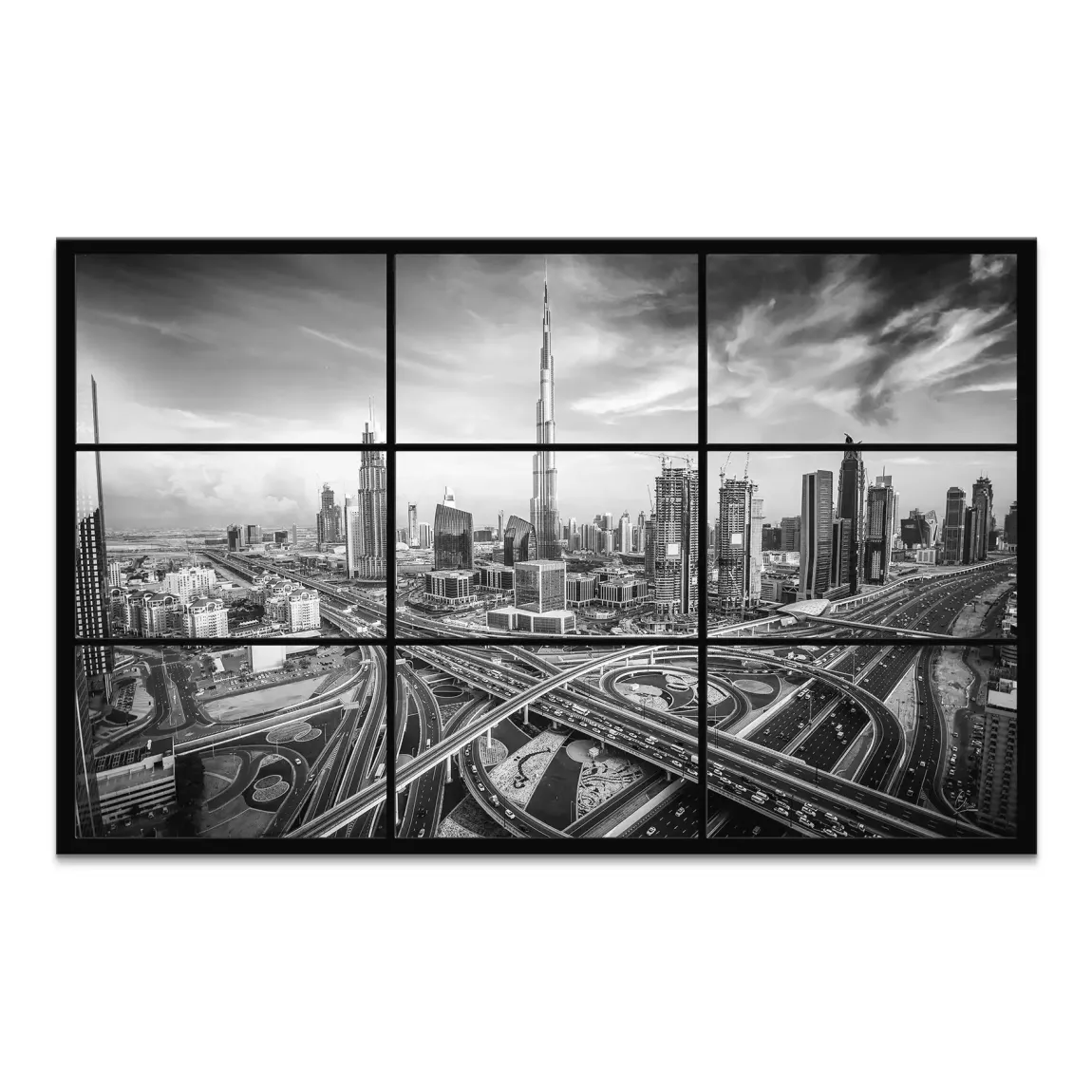Aerial black-and-white skyline of Dubai featuring the Burj Khalifa among tall glass skyscrapers