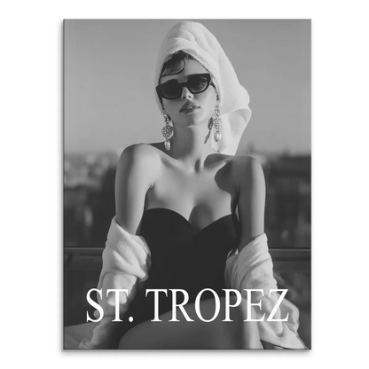 Black and white canvas print of a glamorous model wearing a strapless swimsuit with a head wrap, sunglasses and earrings