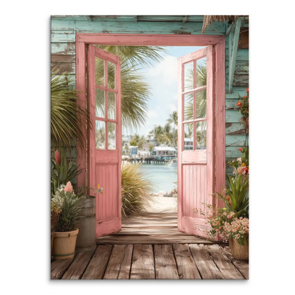 Coastal Escape canvas print showing a pink doorway framing a turquoise tropical beach with palm trees.
