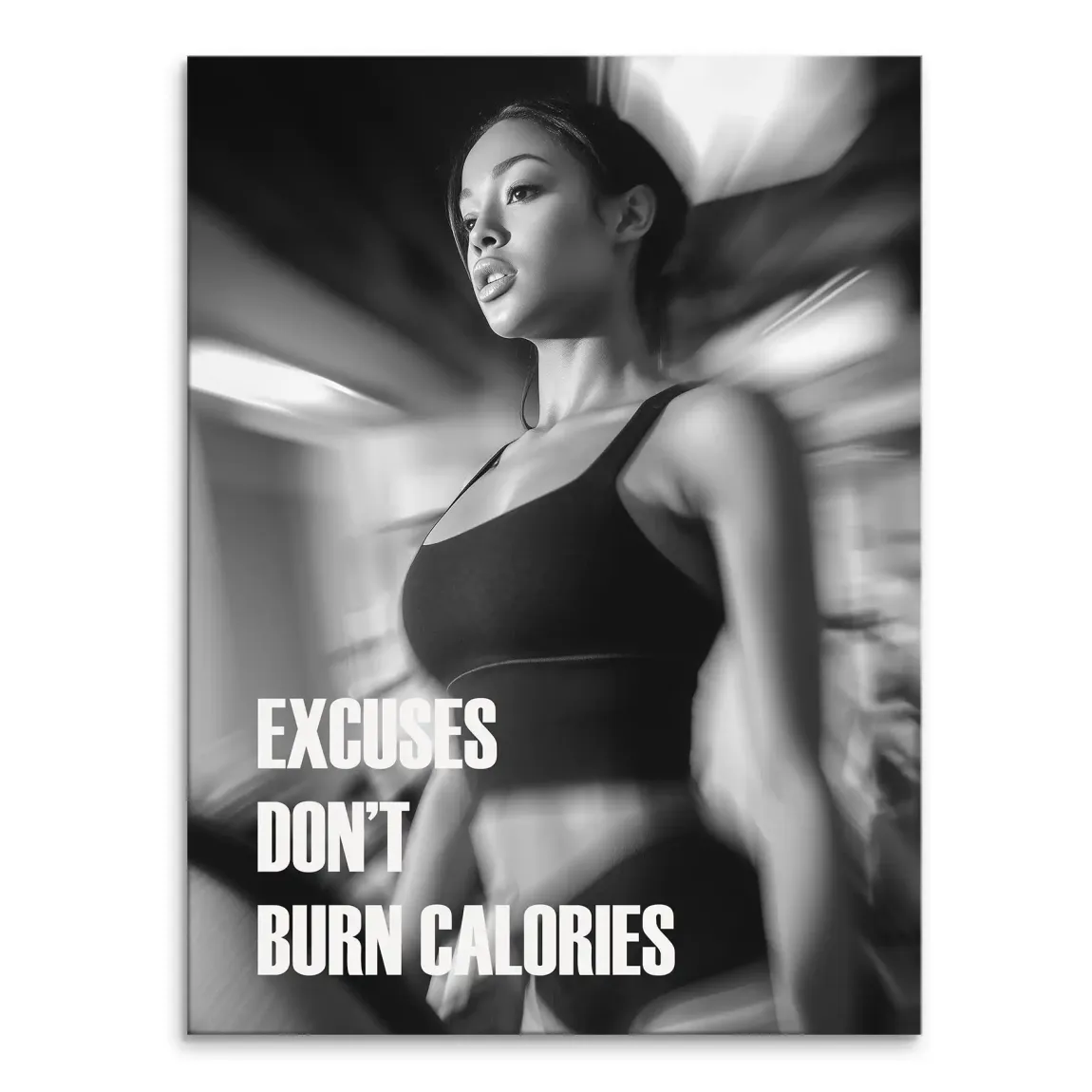 Black-and-white fitness canvas print featuring a focused woman in athletic wear in motion