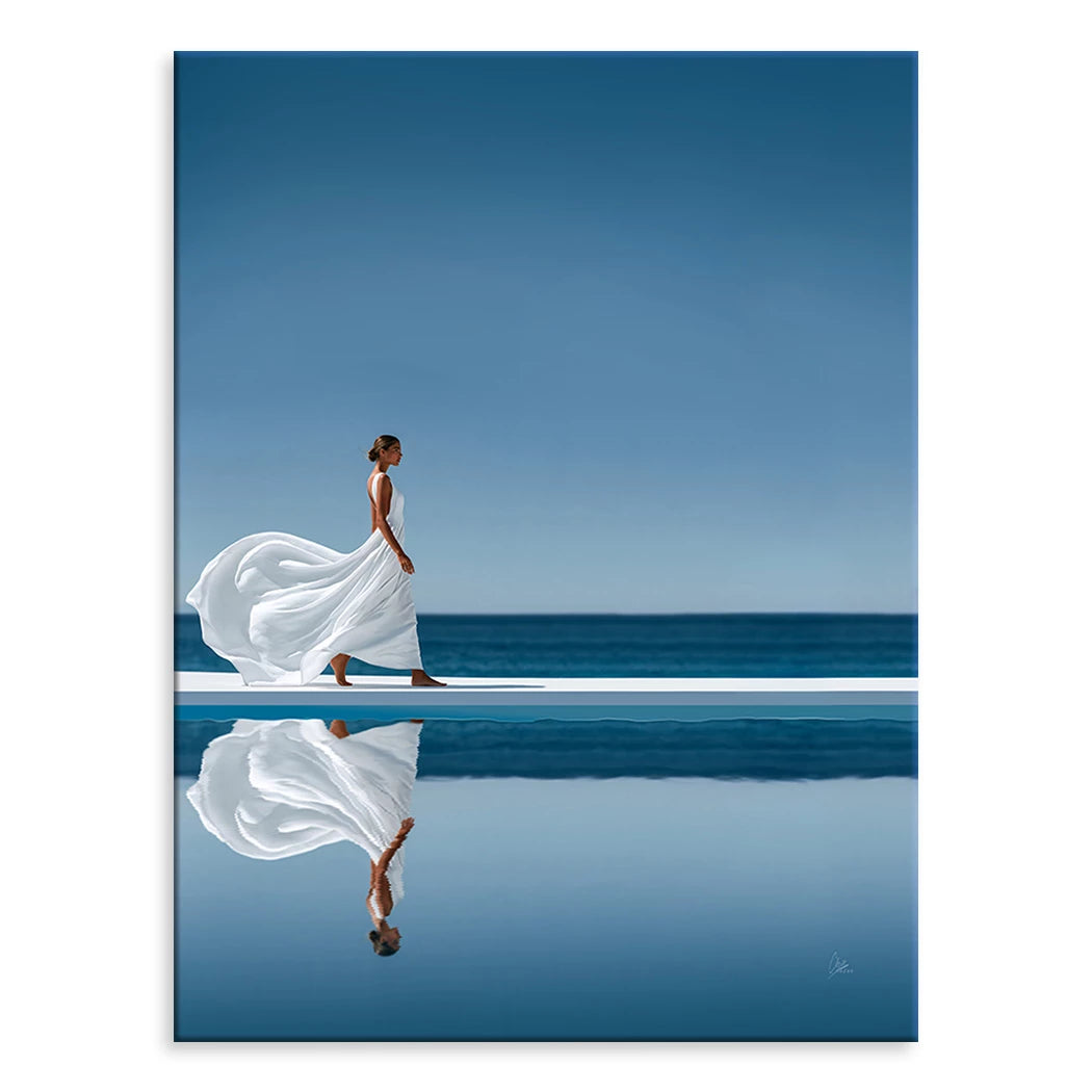 Blue Silence canvas art featuring a woman in a flowing white dress by an infinity pool with a blue sky and ocean horizon.