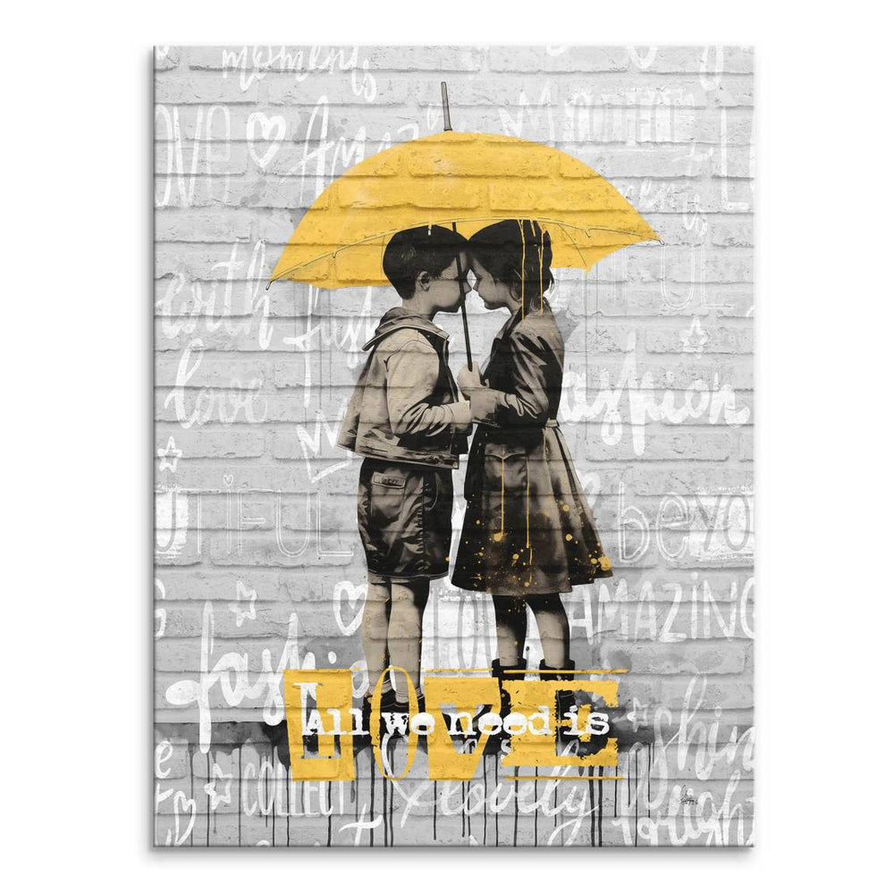 Monochrome canvas of two children under a yellow umbrella against a brick wall