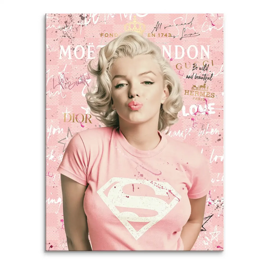 Marilyn Monroe blowing a kiss on a pink pop art canvas wearing a pink Superman tee