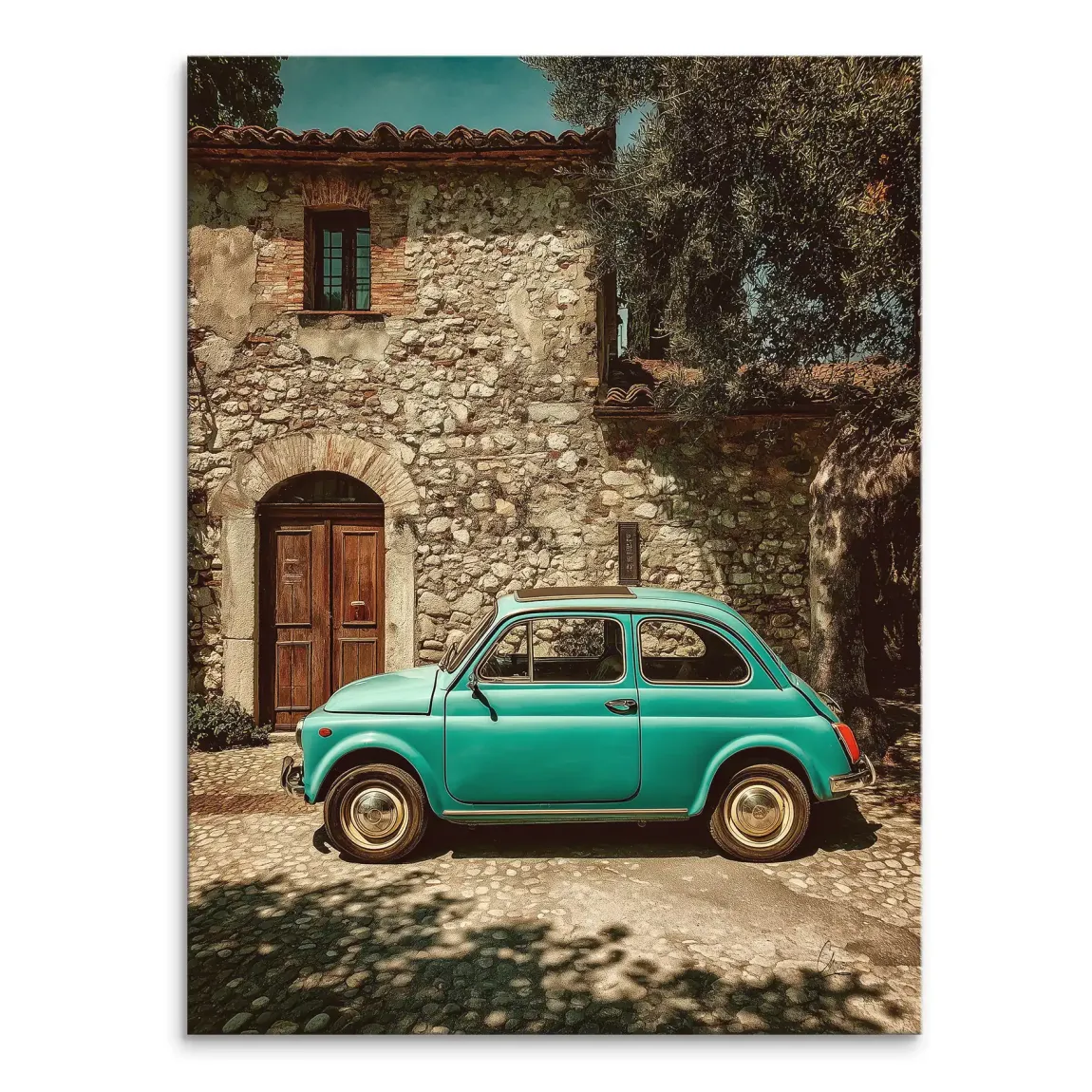 Teal vintage Fiat 500 parked on a sunlit Italian cobblestone street beside a rustic stone building.