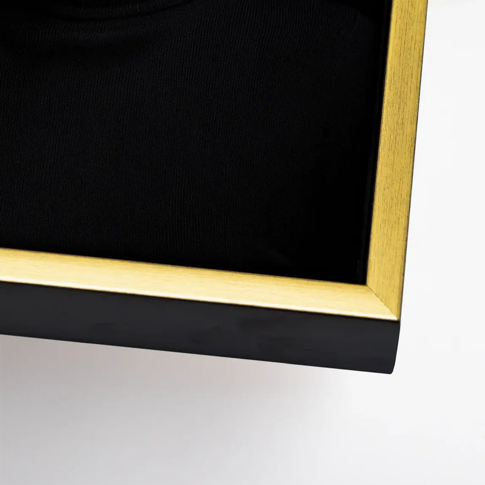 Statement piece with vibrant pink accent on a dark background