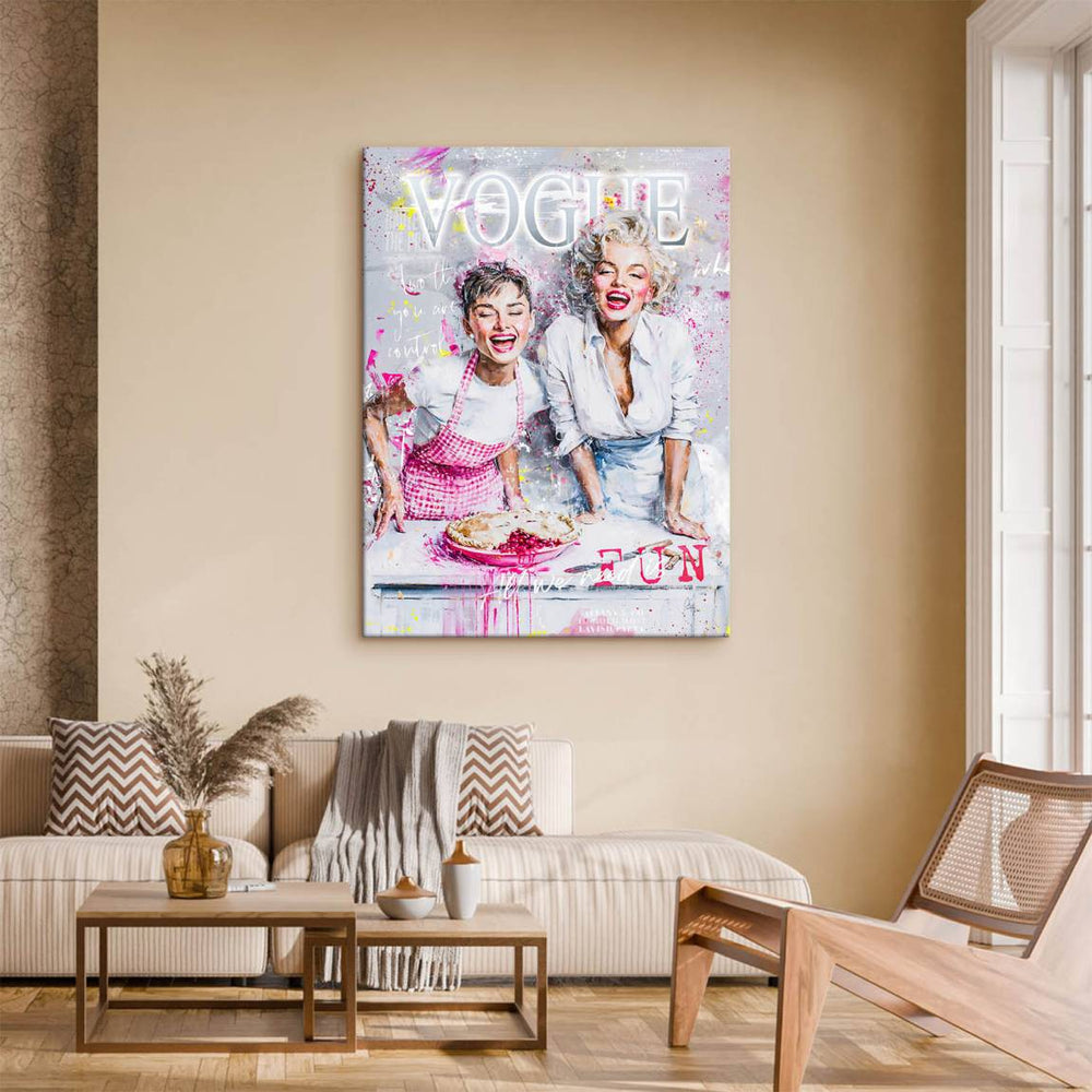 A vibrant pop-art canvas with pink, white, and silver splashes and a prominent Vogue logo