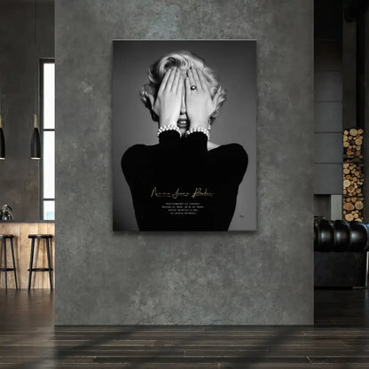 Gold Norma Jeane Baker signature on grayscale wall art with pearls