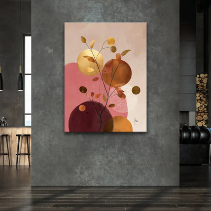 Delicate gold branches and warm-toned leaves in a botanical-inspired composition