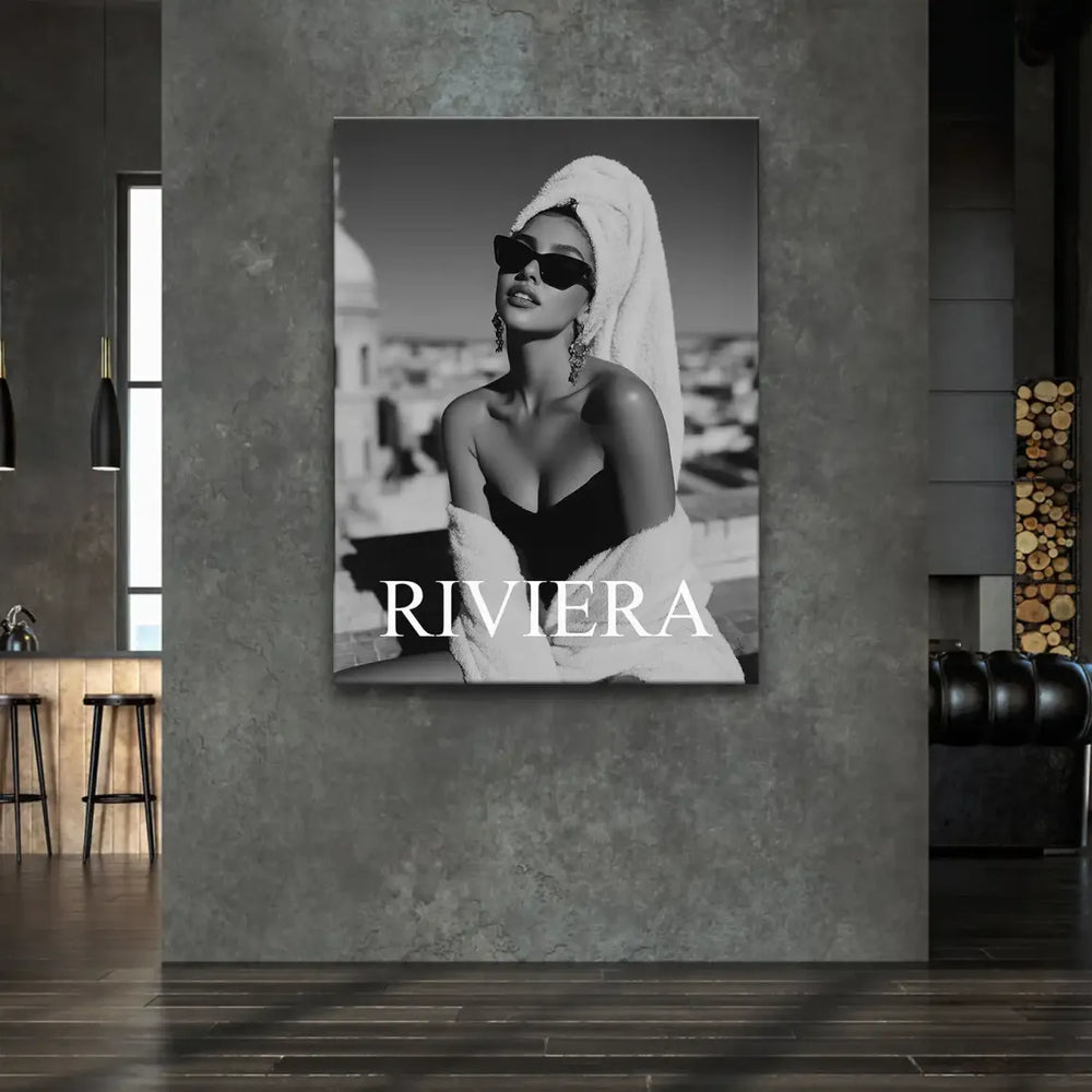 High-contrast fashion wall decor with Riviera Glam text in a cityscape setting.