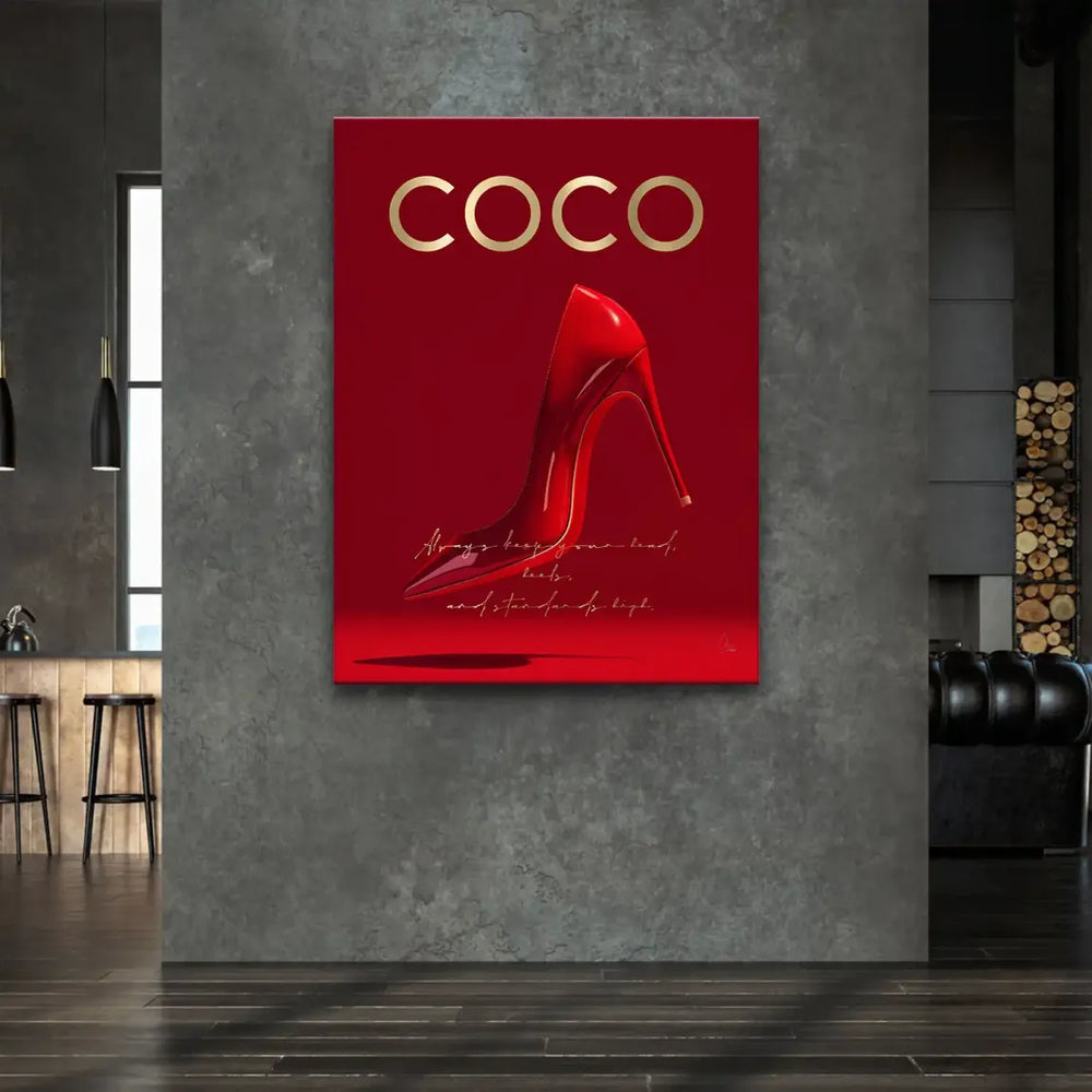 Gold COCO lettering atop a red fashion canvas artwork